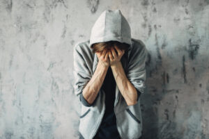 depressed man struggling with methamphetamine addiction