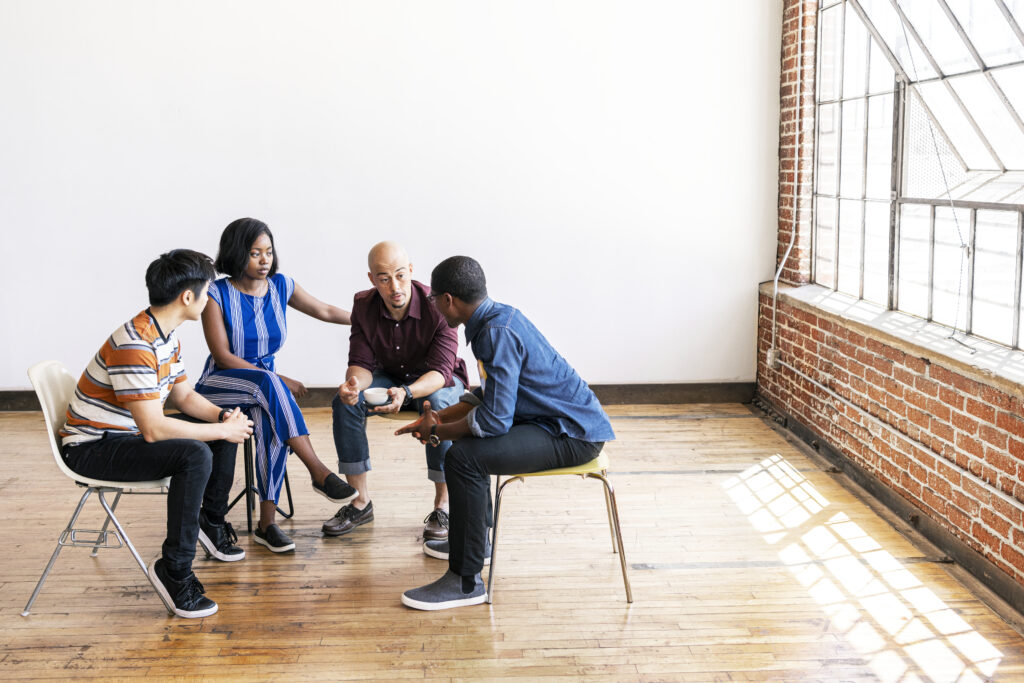 Diverse people in a support group