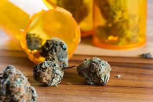 close-up-of-cannabis-buds-with-orange-prescription-2026-01-11-10-22-01-utc